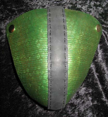 Green hologram lizard codpiece, brass snaps.