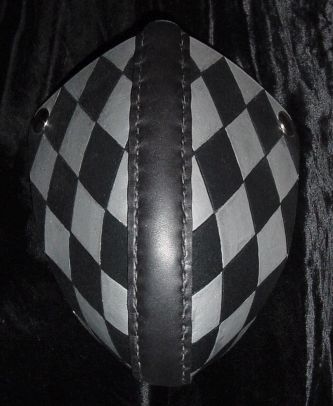 Silver & black harlequin codpiece.